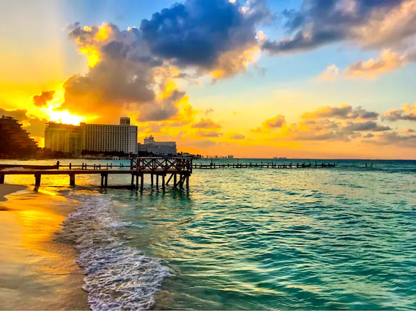 Caracol Beach near Dreams Sands Cancun Resort & Spa with white sand shoreline and Caribbean Sea views