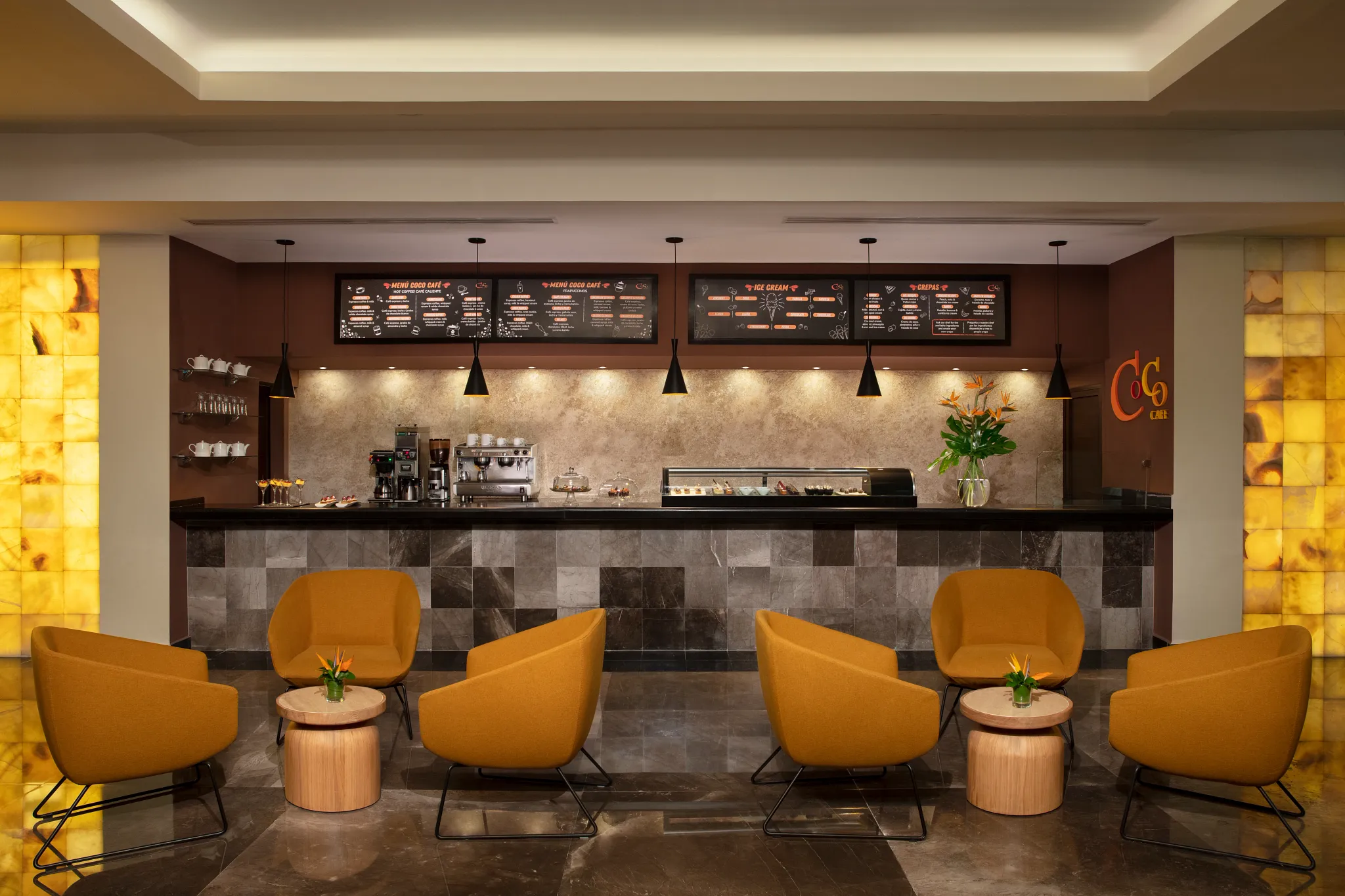 Coco Café and Ice Cream Parlor at Dreams Sands Cancun Resort & Spa featuring specialty coffee drinks, sweet treats, and casual café seating.