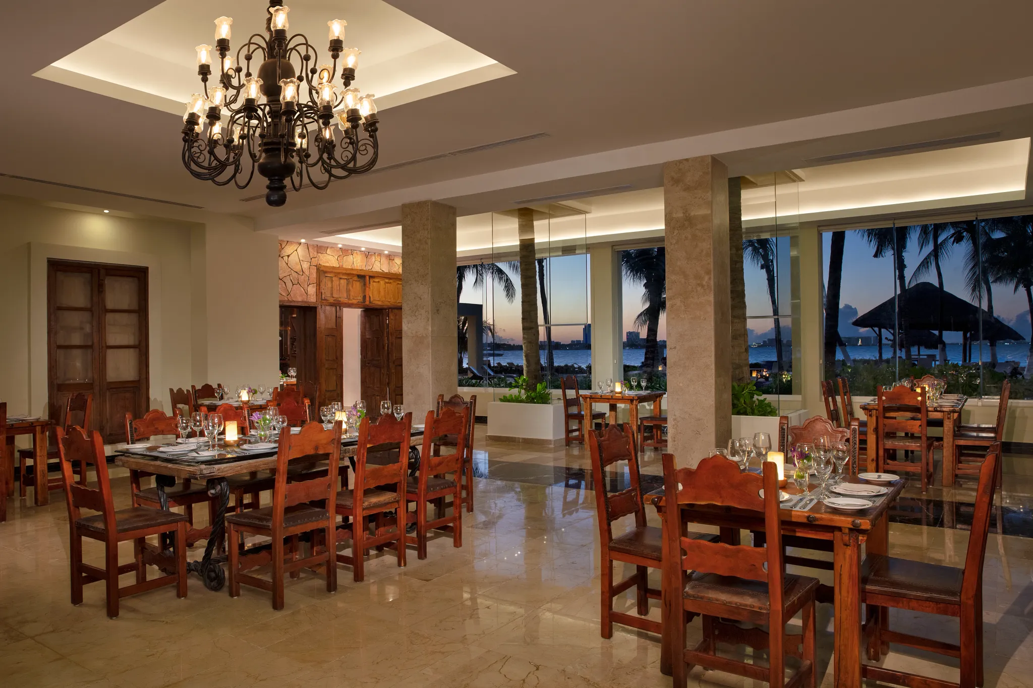 Gaucho Grill at Dreams Sands Cancun Resort & Spa featuring grilled specialties, elegant steakhouse dining, and warm contemporary décor.
