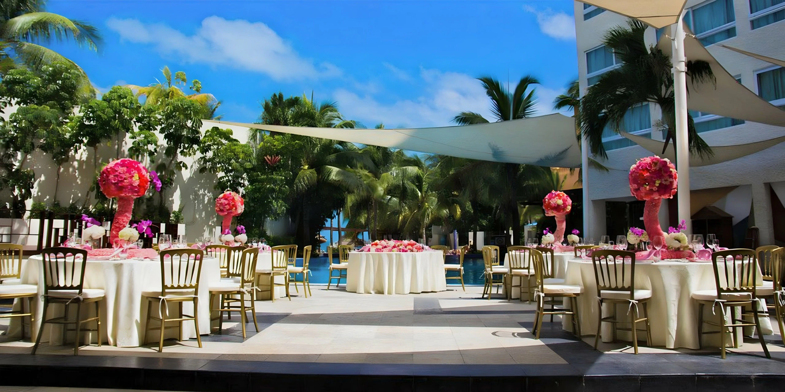 Infinity Pool Terrace wedding reception setup at Dreams Sands Cancun Resort & Spa