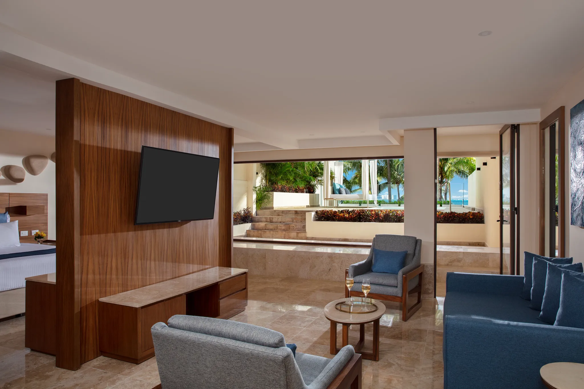 Preferred Club Honeymoon Plunge Pool Suite living area with ocean views at Dreams Sands Cancun Resort & Spa.