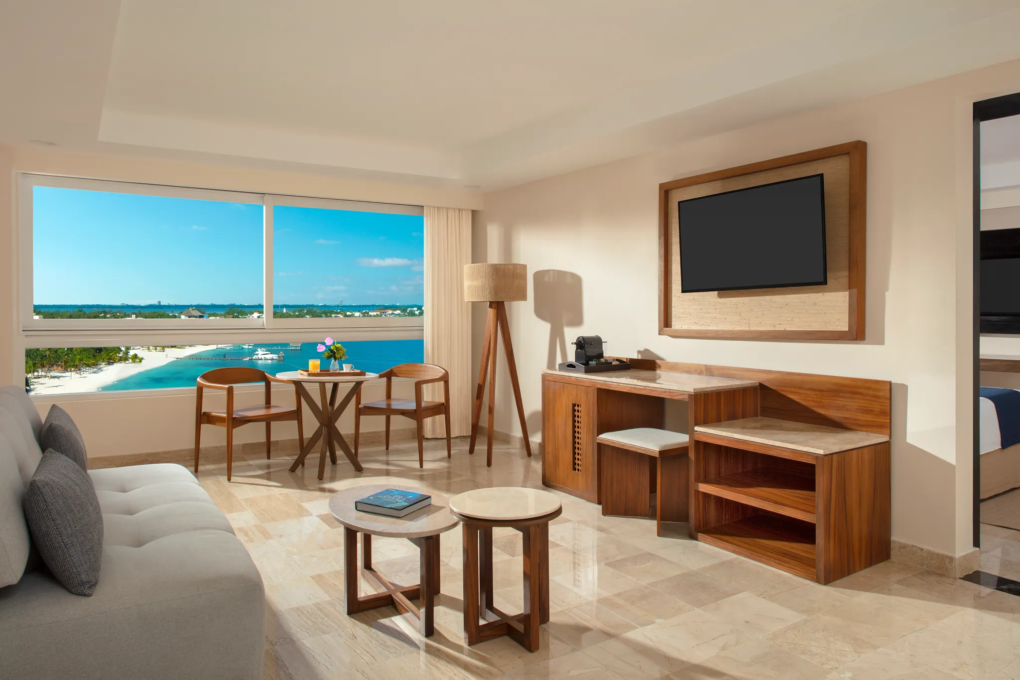 Preferred Club Master Suite living room with oceanfront views at Dreams Sands Cancun Resort & Spa.
