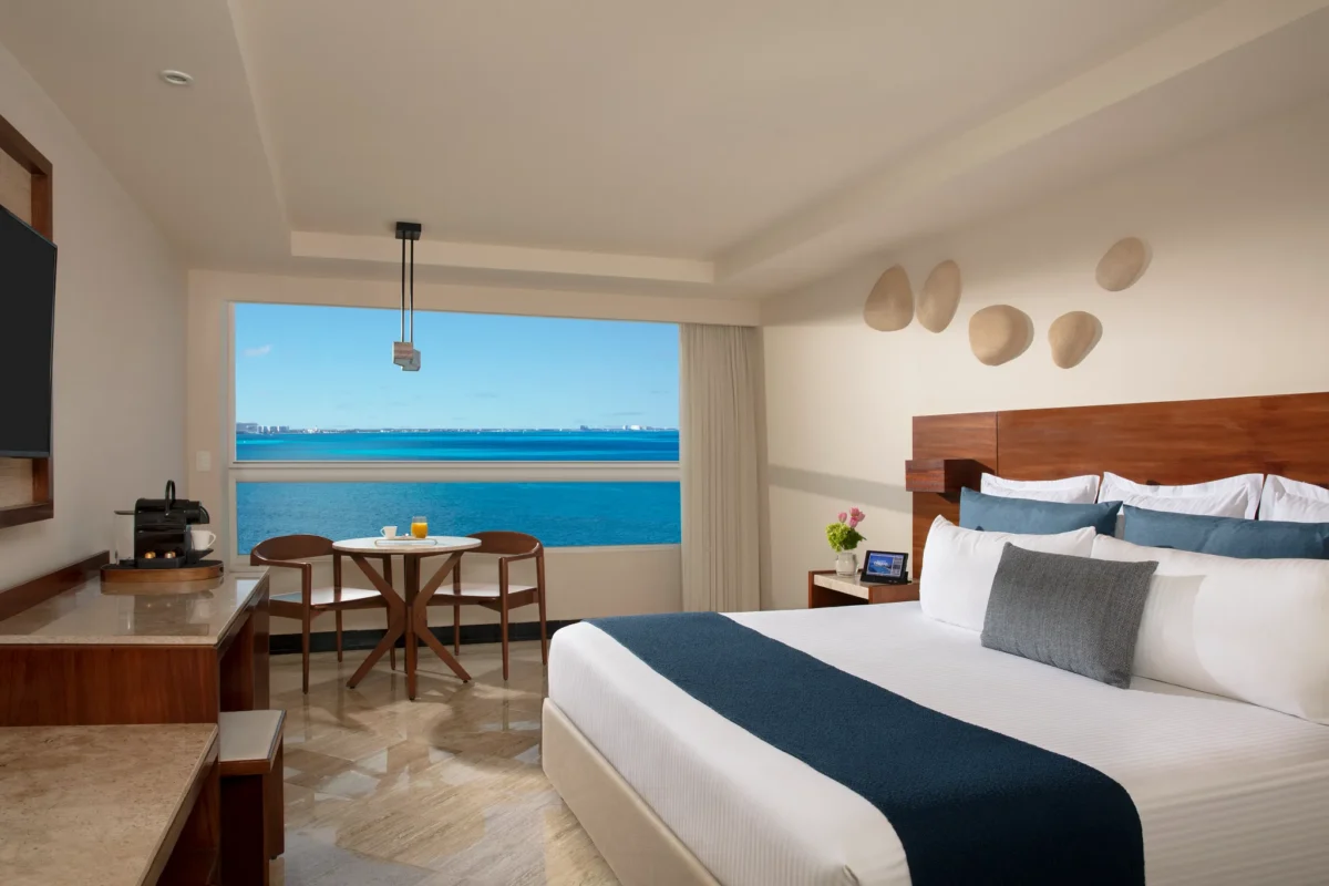 Preferred Club Ocean Front king room with ocean views at Dreams Sands Cancun Resort & Spa.